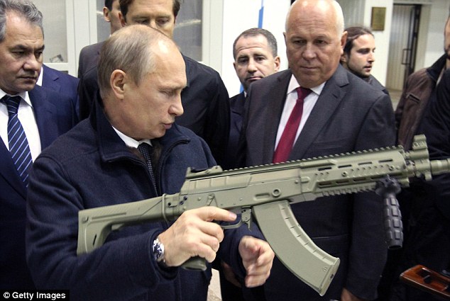 34500c7100000578-0-a_spokesman_for_vladimir_putin_pictured_posing_with_a_kalashniko-a-33_1463591381782